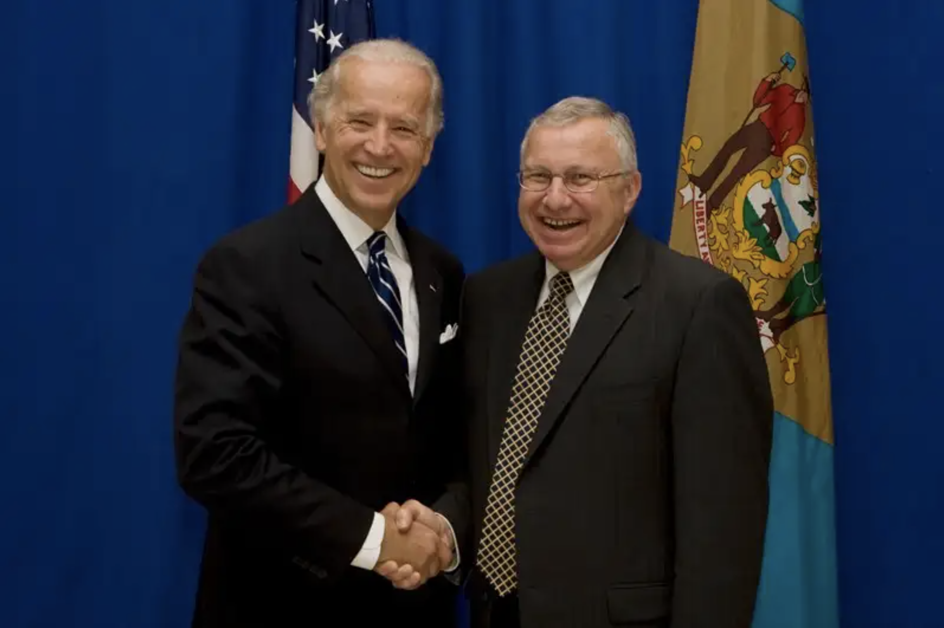 Joe Biden and Dan Rich shaking hands